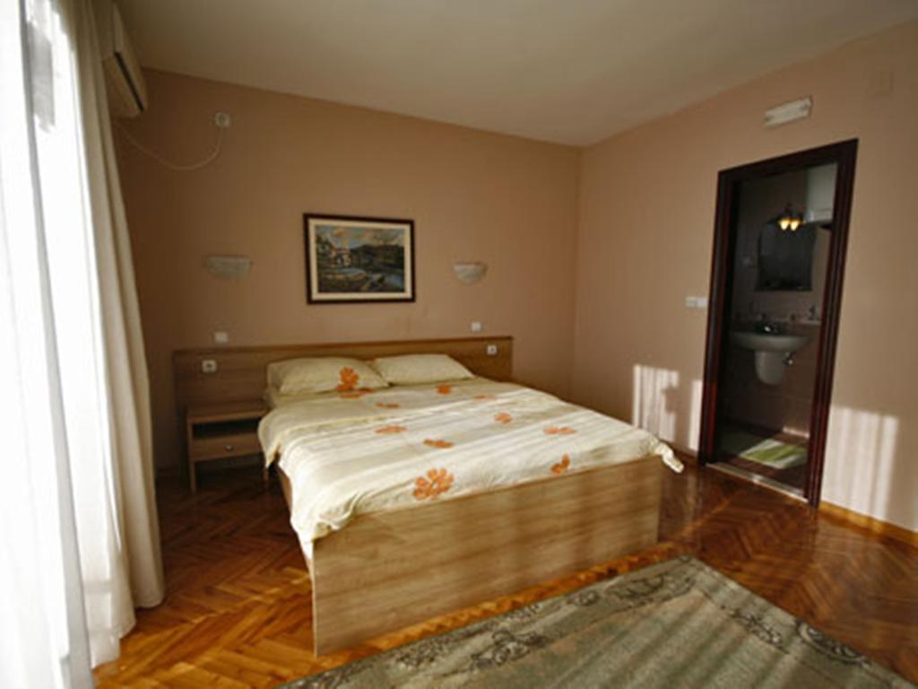 Hotel Ambiente Podgorica Quarto foto